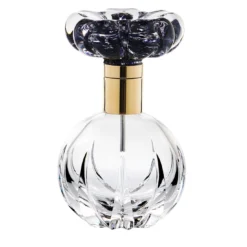 Bottiglia di profumo Cistus con fiore nero