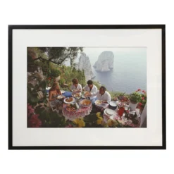 Cena all'aperto a Capri Stampa con cornice di Slim Aarons
