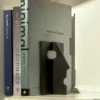 Fermalibri Mister T in acciaio di Philippe Tabet