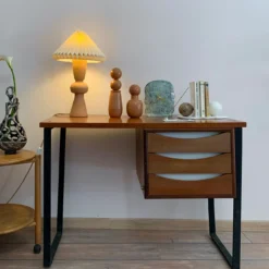 Fermalibro in ceramica con 2 sfere e base