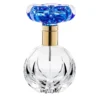 Flacone di profumo Cistus con fiore blu