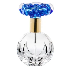 Flacone di profumo Cistus con fiore blu