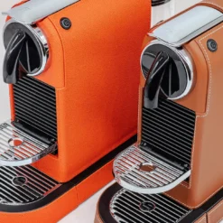 Macchina da caffè Citiz Nespresso in pelle arancione