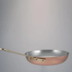 Padella di rame rigonfia foderata d'argento