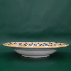 Piatto fondo con piume di pavone giallo