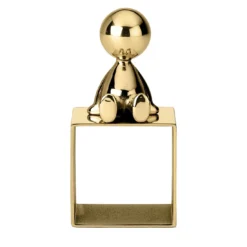 Portatovaglioli Omini Top in ottone lucido di Stefano Giovannoni