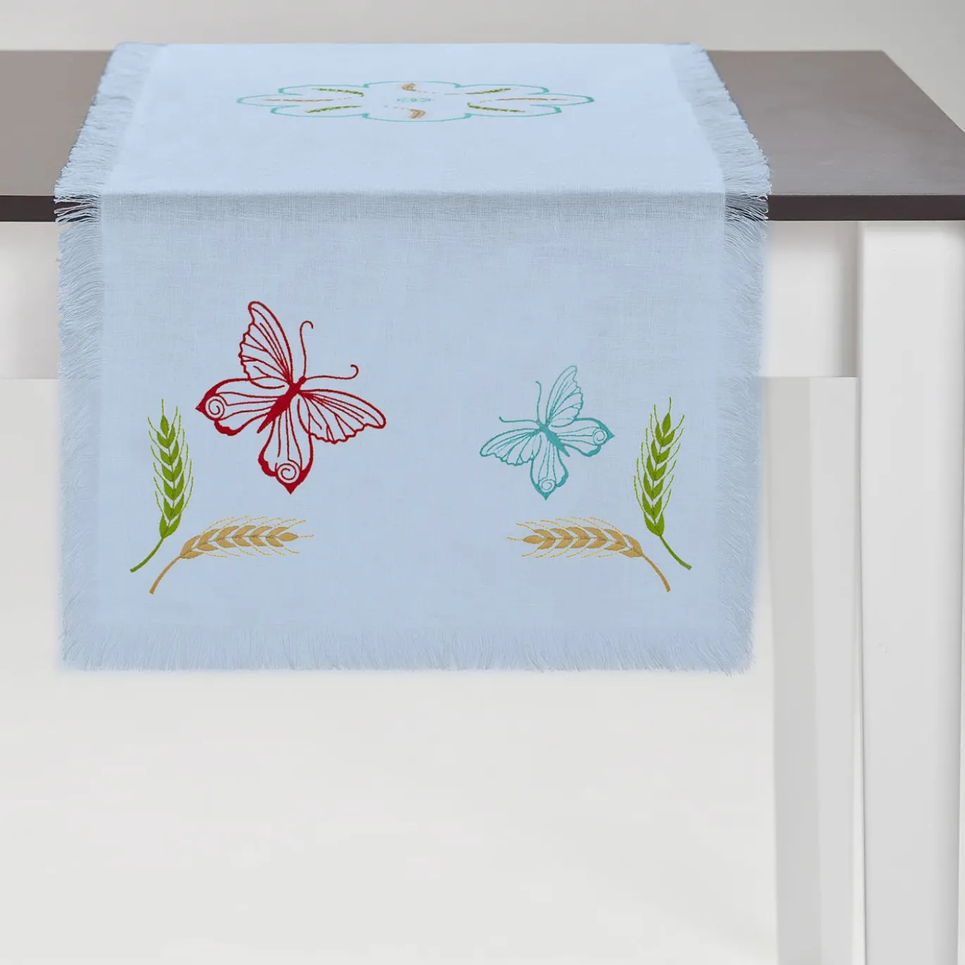 Runner azzurro con frange multicolore Grano