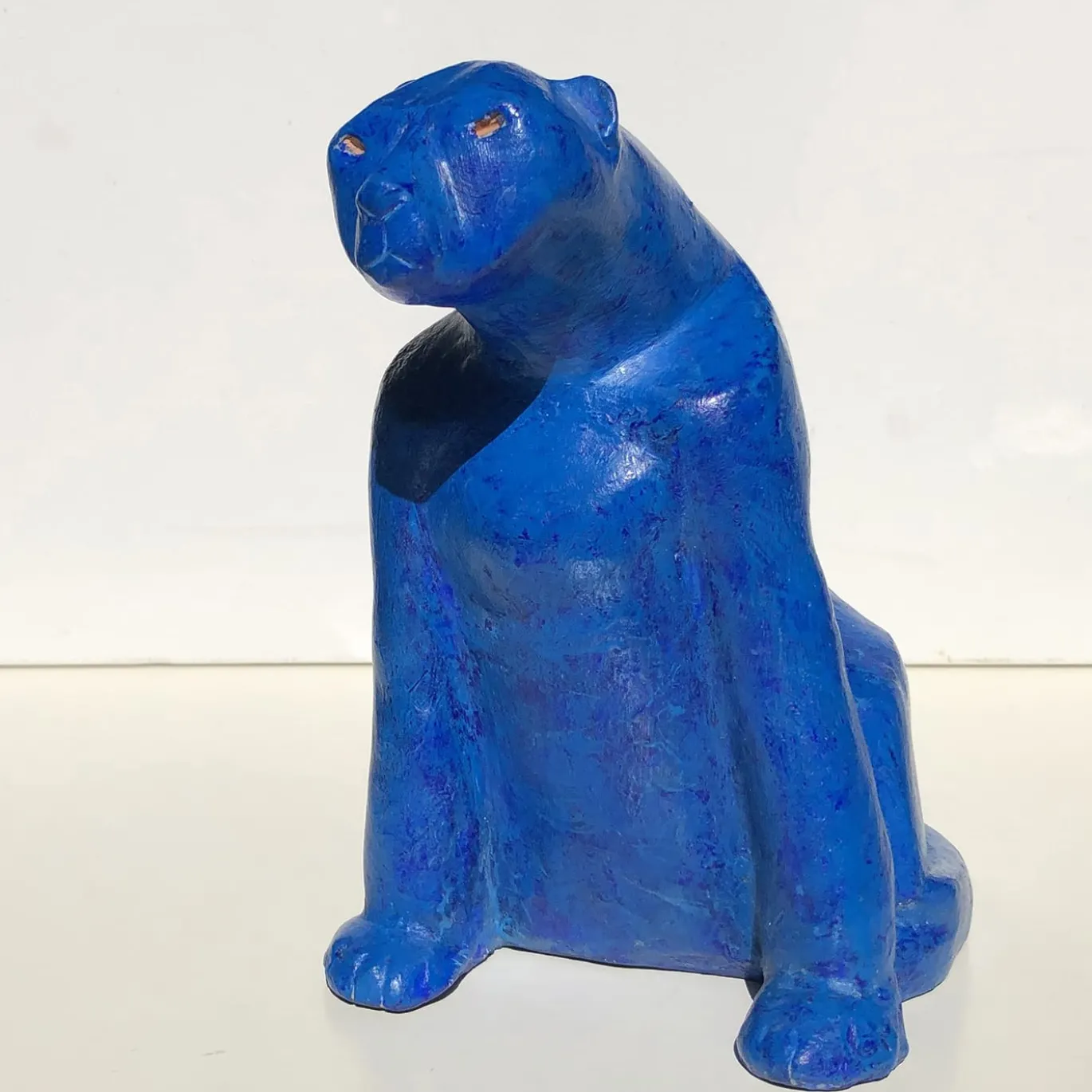 Scultura di pavone-pantera blu