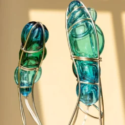 Scultura in metallo e vetro di Murano Miss Joushua