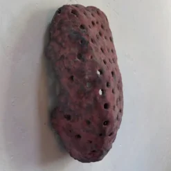Scultura in resina rossa scura Forma