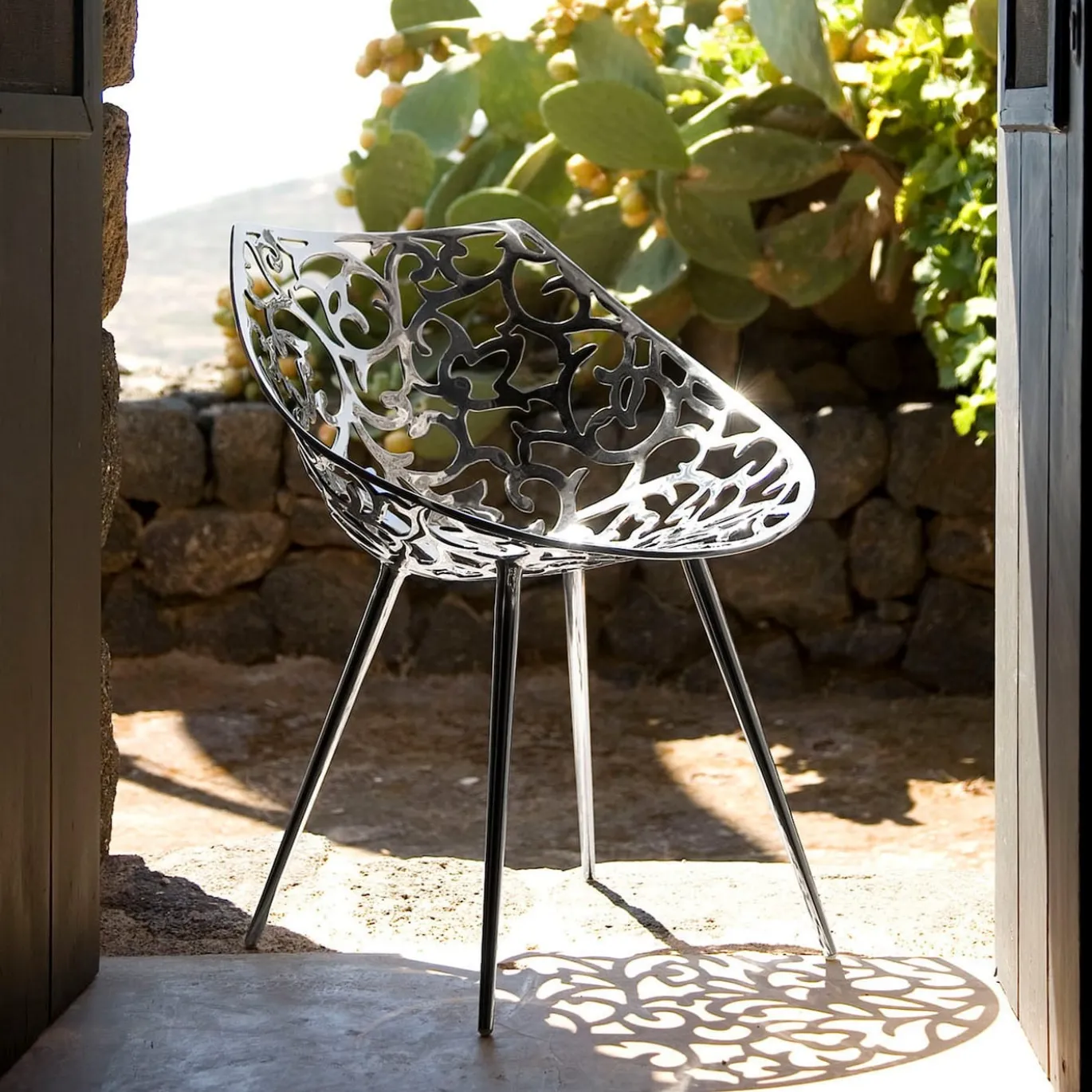 Sedia Miss Lacy Traforata in Acciaio Inossidabile Argento di Philippe Starck