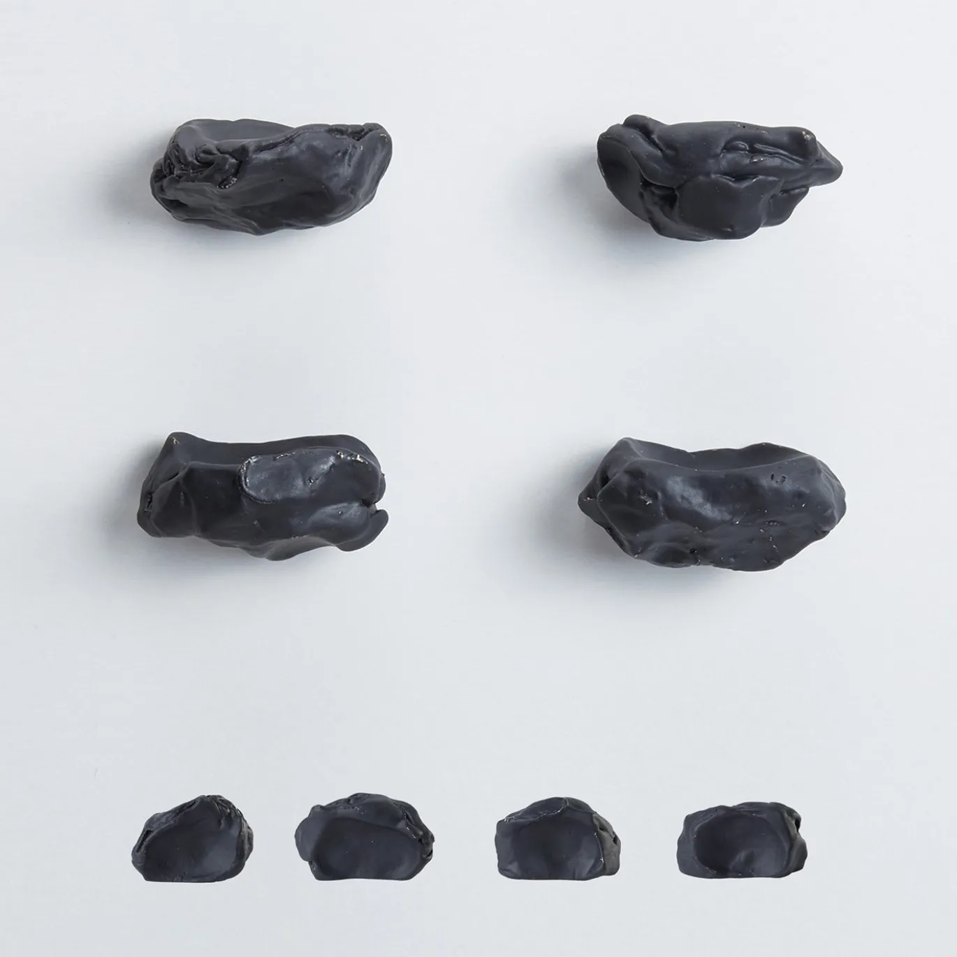 Set di 4 pomelli neri per porte Impronta #1 di Nicole Valenti