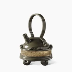 Teiera vintage in nero e oro di Pierre Marie Agin