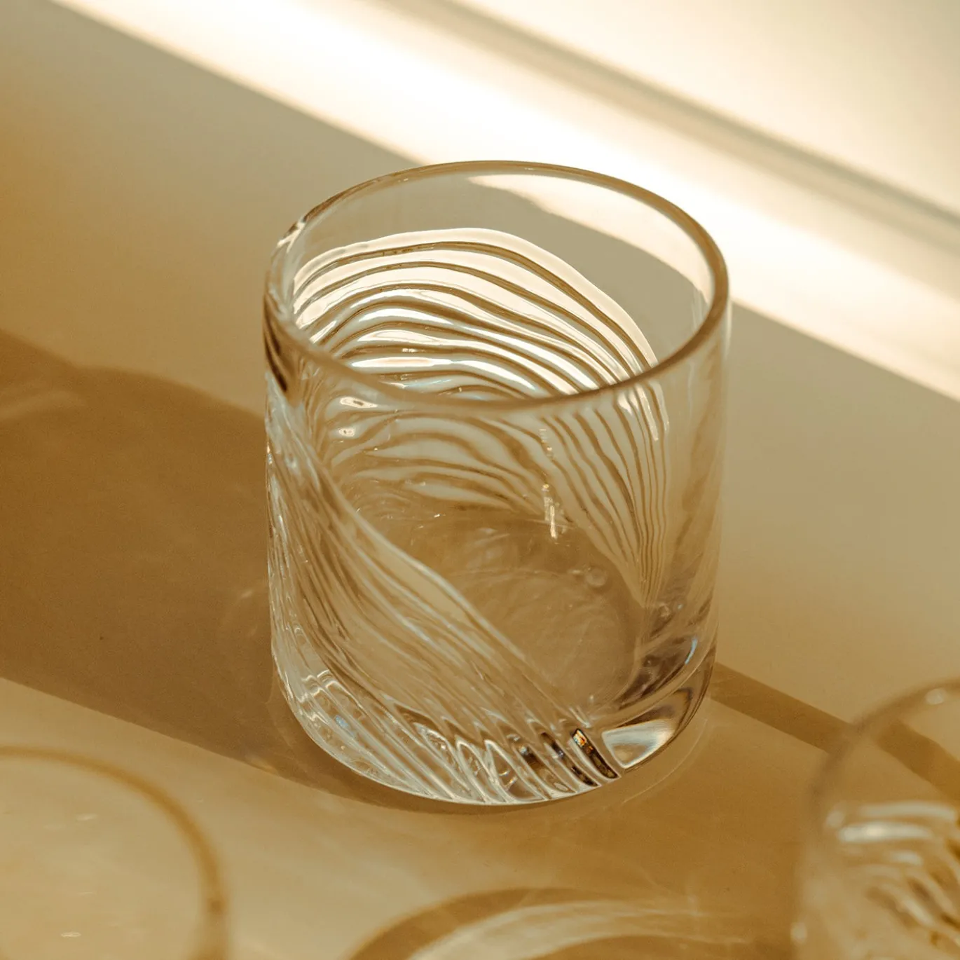 Tumbler in cristallo trasparente Zefiro inciso a mano